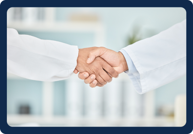 An image of two doctors handshaking